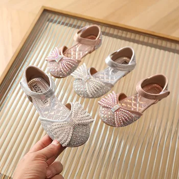 Обувь принцессы, Блестящие весенние новые сандалии для девочек с украшением в виде кристаллов, детские сандалии с искусственным корейским жемчугом и бантом, модные мягкие плоские покрытые носки